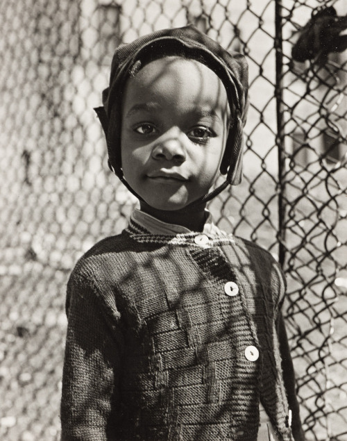  Walter Rosenblum.  Smiling child, 105th Street, New York, 1952.  