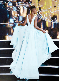 :  Lupita Nyong’o accepts the Best Performance by an Actress in a Supporting Role award for ‘12 Years a Slave’ onstage during the Oscars at the Dolby Theatre on March 2, 2014 