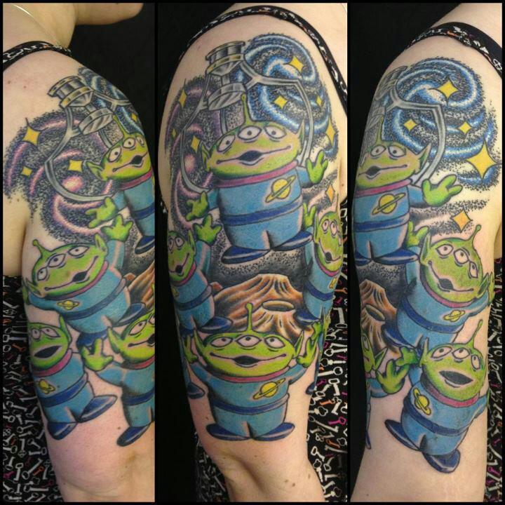 fuckyeahtattoos:  My Toy Story alien half sleeve.By Daniel Morris @ Rain City, Manchester,
