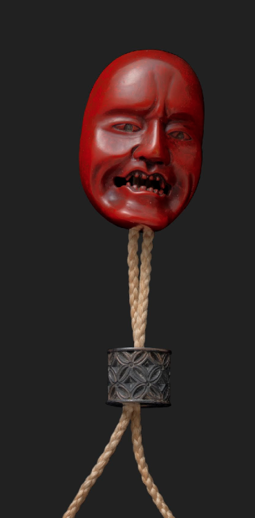 rumforall:desimonewayland:Inro with netsuke sculpted in red lacquer in the form of a mask.Unknown, J