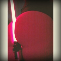 buttsbottomsandbooties:  Don’t worry, it’s not a real lightsaber. 