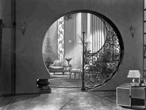 crimsonkismet:a round-shaped interior doorway with an art nouveau design from the 1930’sthis reminde