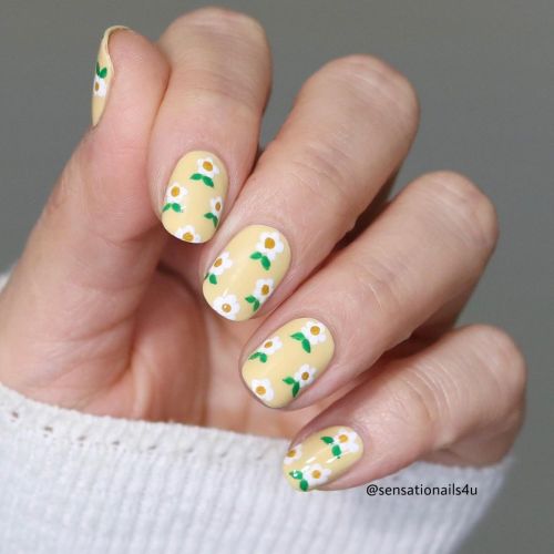 Cute floral nails for Spring time ☀️ The yellow base color is Bee-hind the Scenes from @opi and the