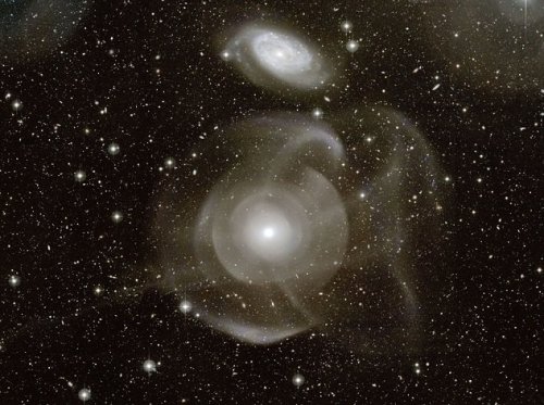 NGC 474: See that odd formation? No one really has an answer for this galaxy and why it looks so wei