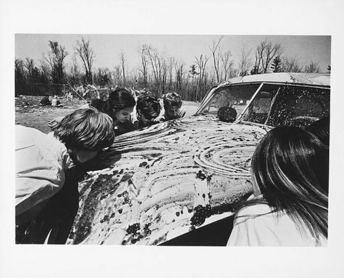 Sol Goldberg’s photograph of participants in Allan Kaprow’s ‘Women licking jam off a car,’ from his 