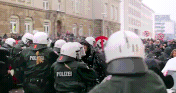 kropotkindersurprise:  2013 - Antifascists break through police lines to block a