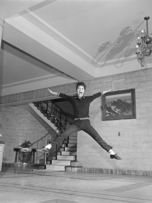 s-h-o-w-a:  Famous Japanese people, including  Honda Motor Co. founder  Soichiro Honda, actor Toshiro Mifune and singer Mie Nakao, jump for The Asahi Simbun newspaper in January  1963