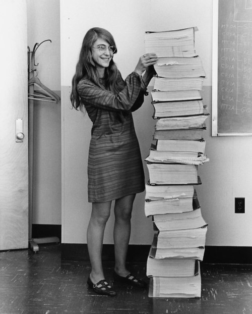Hamilton In 1969, Standing Next To Listings Of The Software She And Her MIT Team Produced For The Apollo
