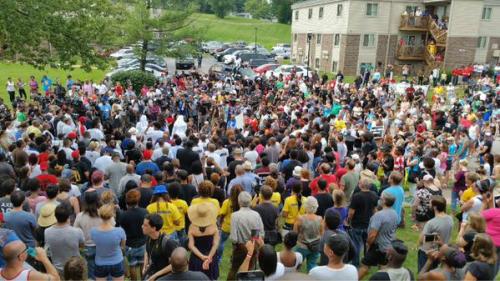 justice4mikebrown: August 9, 2015One year later, hundreds of people gather on Canfield Drive in memo