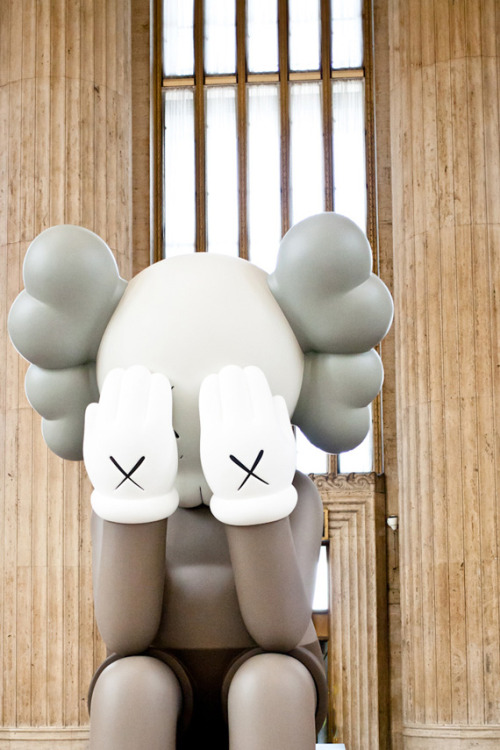 XXX cozm:  Kaws Companion “Passing Through” photo