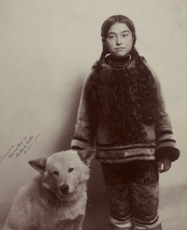 Inuit girl Nancy Columbia and her dog.  Picture taken at the World’s Fair 1904