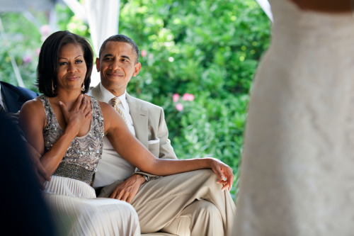 hazardice06:  thepoetsspace:  mywindowview:  julyshewillfly:   June 18, 2012: The First Lady reacts as she watches Laura Jarrett and Tony Balkissoon take their vows during their wedding at Valerie Jarrett’s home in Chicago.    What I love about this