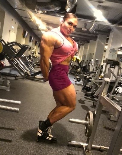 zimbo4444:  ..Natalia Trukhina..”The World’s Most Muscular Woman”..super strong & super beautiful & only 24yo..slightly over 5'5” tall 211 lbs & has over 18″ biceps.. 💪🏼😺👍🏼 ..Jr. proudly says..”my Mom can beat up