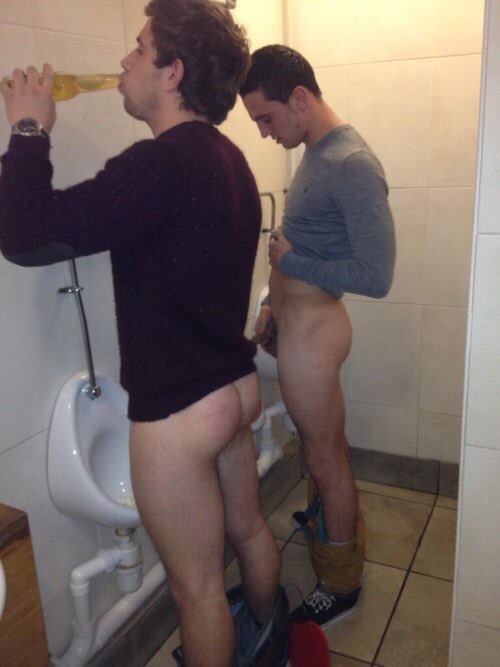 prettyboysbeautifulmen:Pants down pissing…and drinking, apparently
