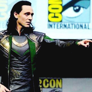 definitely-evil:Tom Hiddleston takes the stage at the Thor: The Dark World panel as his villainous c