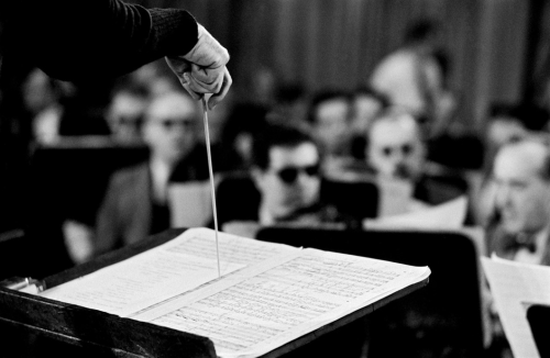 barcarole:Leonard Bernstein conducting the New York Philharmonic in 1958, by Bruce Davidson.