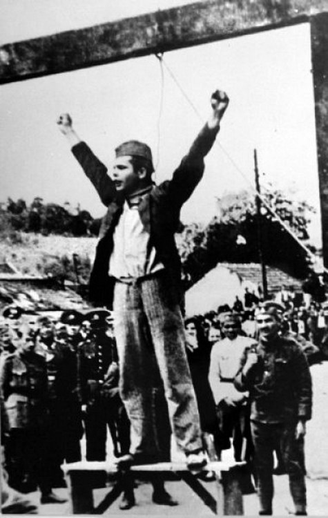 Croatian-born Yugoslav partisan Stjepan Filipović shouts “Death to fascism, freedom to the people!” 