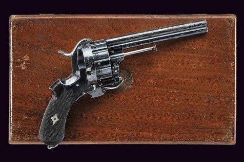 peashooter85:  A rare cased 21 shot folding trigger revolver, France, late 19th century.