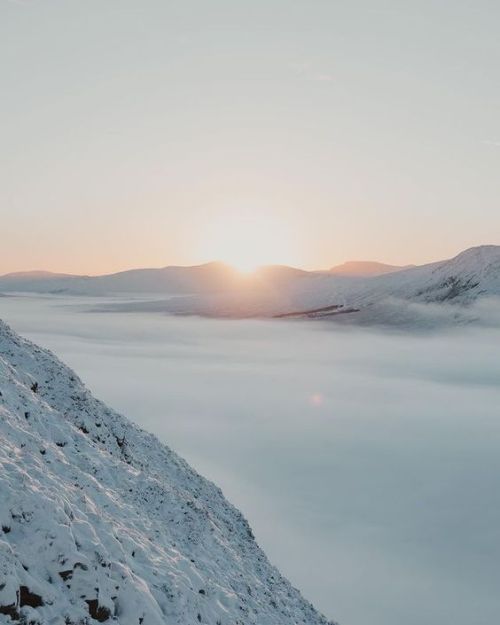 Good Morning from Scotland The sun rising through Glencoe valley with a cloud inversion  www