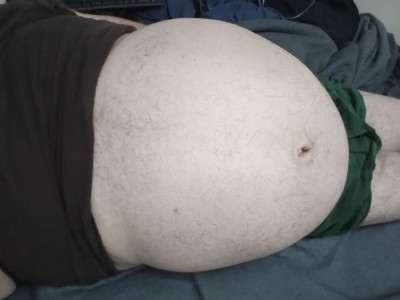 earthyjim:bigbellyct:Celebrated Pi day. Bloated and beached on the bed. Time for