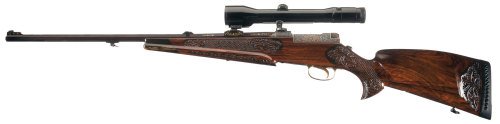 Magnificent engraved, gold inlaid Mauser Model 66S bolt action sporting rifle with carved stock.  Bu