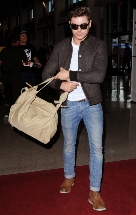Zac was spotted through the airport LAX in Los Angeles March 7, 2014, while he was taking a flight t