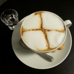 Free-pour cappuccino made with whole milk.