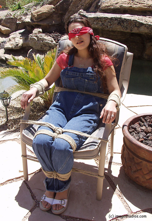 nowheretohide14:  graybandanna:  If you have to be bound, gagged and blindfolded, sitting out on the patio in the sun is a lot nicer than a cold, dark dungeon  I love this. More outdoor photos. 