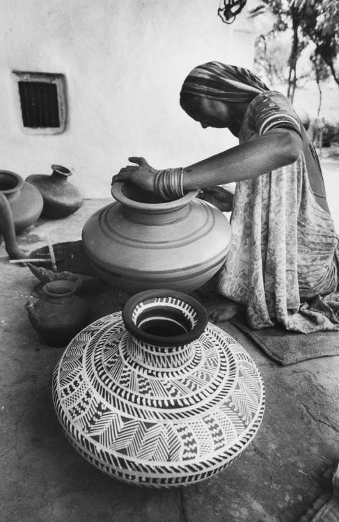 Jyoti Bhatt.   A Potter Woman Decorating a Pot, Kutch, 1975.          