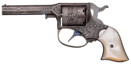 Factory engraved Remington Rider cartridge conversion revolver with pearl grips, 1873.from Rock Isla