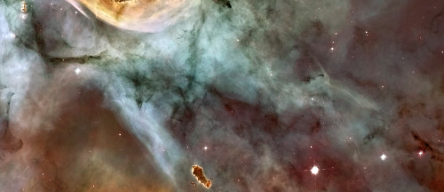 lordofthesvdandlonely:     carina nebula, about 8000 light years away, 50 light years long in this false colour image. bright star in second panel is about 100-150 times the mass of the sun.  