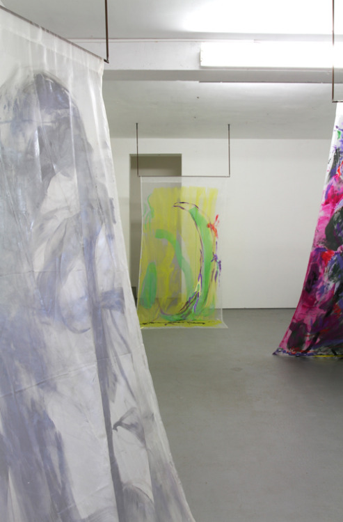JAANA LAAKKONEN
Sharing A Room, A Water Bottle And Who Knows What!
2016
Black tarp on a grey embossed floor. Greenish-yellowish, a slightly see-through tarp in front of a cinder block wall painted white. Located on the right side. On the left, black...
