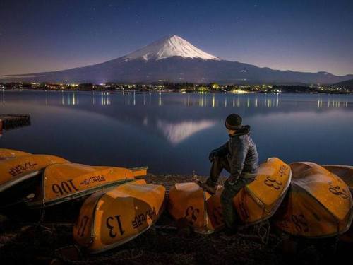 This gorgeous shot shows Japan&rsquo;s Mount Fuji illuminated by moon light and reflected in the