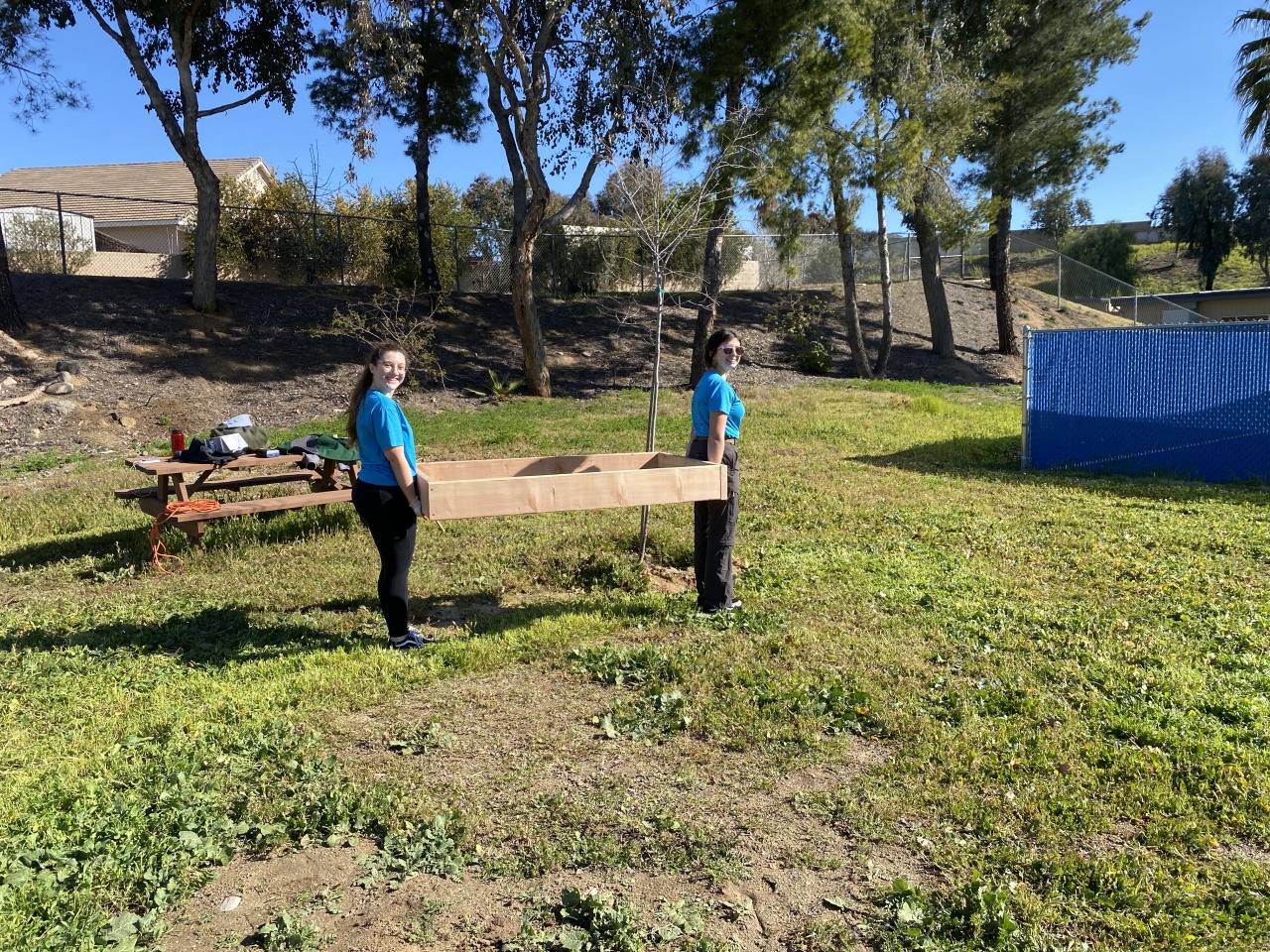 This weekend, Scouts from Troop 318 gathered at Donald Graham Elementary School to help a neighboring Girl Scout with her Gold Award project!