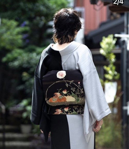 Sleek autumnal kimono outfit, pairing a chic katamigawari stylekimono, with an antique obi depicting