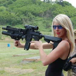 guns-and-babes:Babe with gun http://guns-and-babes.blogspot.com/