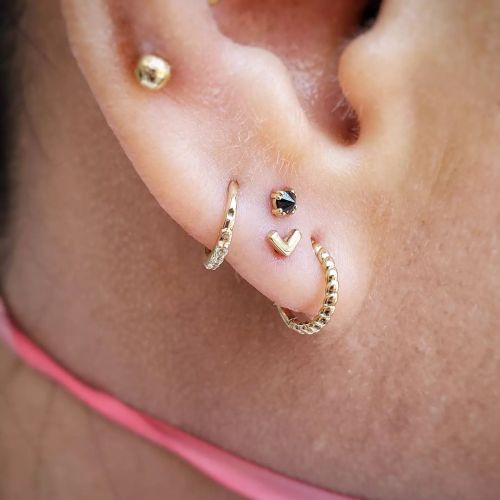 Okay, back to our regularly scheduled piercing content. More stacked lobes! This time with a reverse