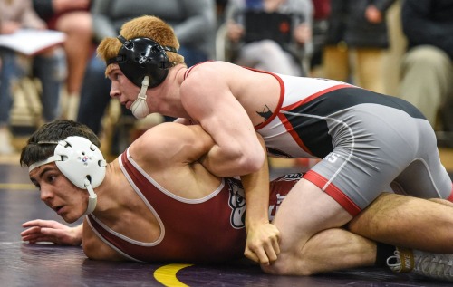 The team with this gray / black / red singlet shows up in a lot of pics of jocked wrestlers. I think