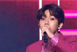 baehkkyun:  black haired baek in pink suit