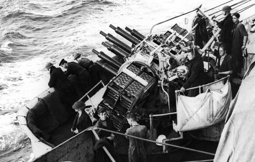 A warship of the British Mediterranean Fleet bombarding Fort Capuzzoat Bardia (Libya, June 21st, 194