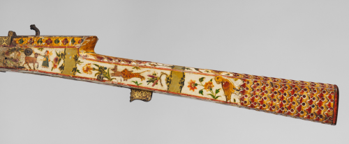 A magnificently decorated matchlock rifle originating from India, 18th century.  Note the square bor