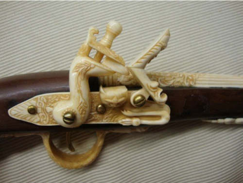 Decorative “flintlock pistol” carved from ivory
