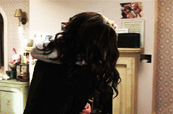 :  I tightened my grip on her arm, digging my nails in to get her attention. She flinched.