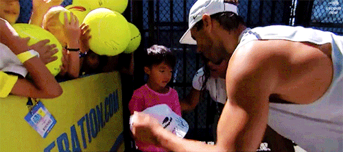 Rafael Nadal Comforts A Crying Child At A U.S. Open Fan Signing