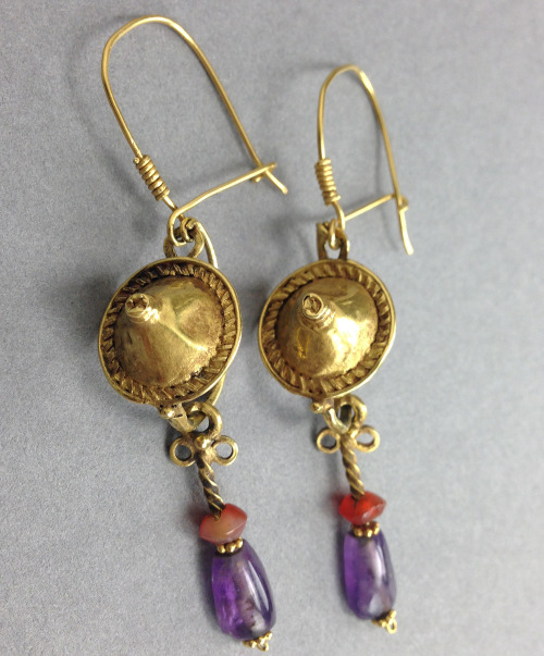 rodonnell-hixenbaugh: Roman Gold and Amethyst Earrings A pair of large ancient Roman gold shield ear