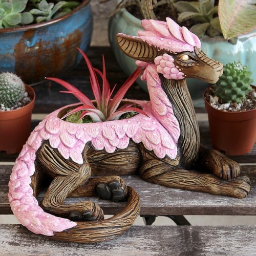 dovewithscales: half-human-machine: unseelie-witch: sosuperawesome: Planters by Emily Coleman on Ins