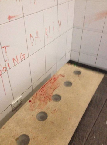 sadestiny:  sixpenceee:  A local bus station in England with walls covered in blood writing. It says