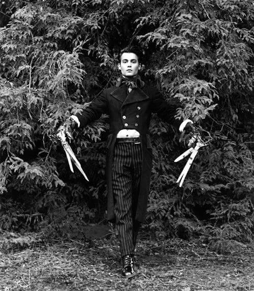 hellyeahhorrormovies:Johnny Depp posing as Edward Scissorhands 1990. That is a nice suit, but where 