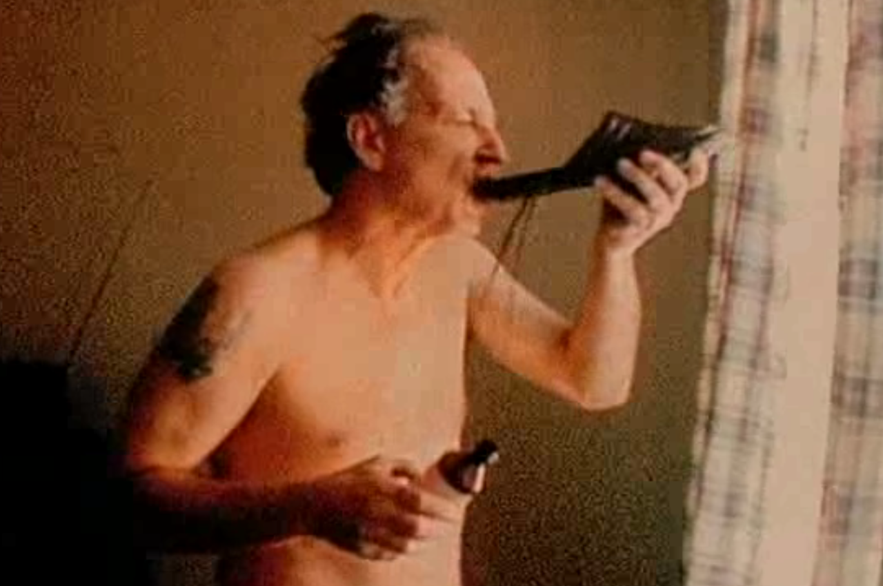 disregardinghenry:Werner Herzog drinks cough syrup from a shoe. Harmony Korine’s