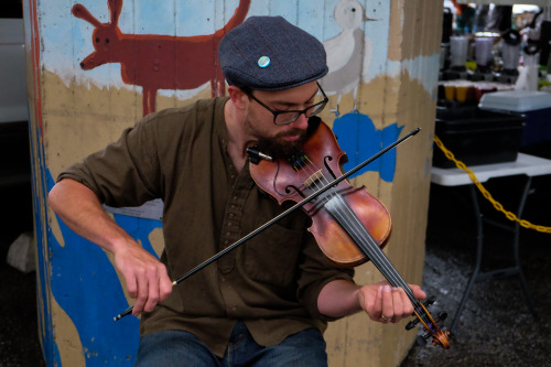 Fiddler in the Rain Why confine yourself in practice rooms and concert halls when the whole street c